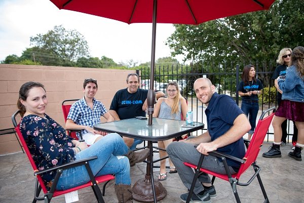smiling guests from the grand opening